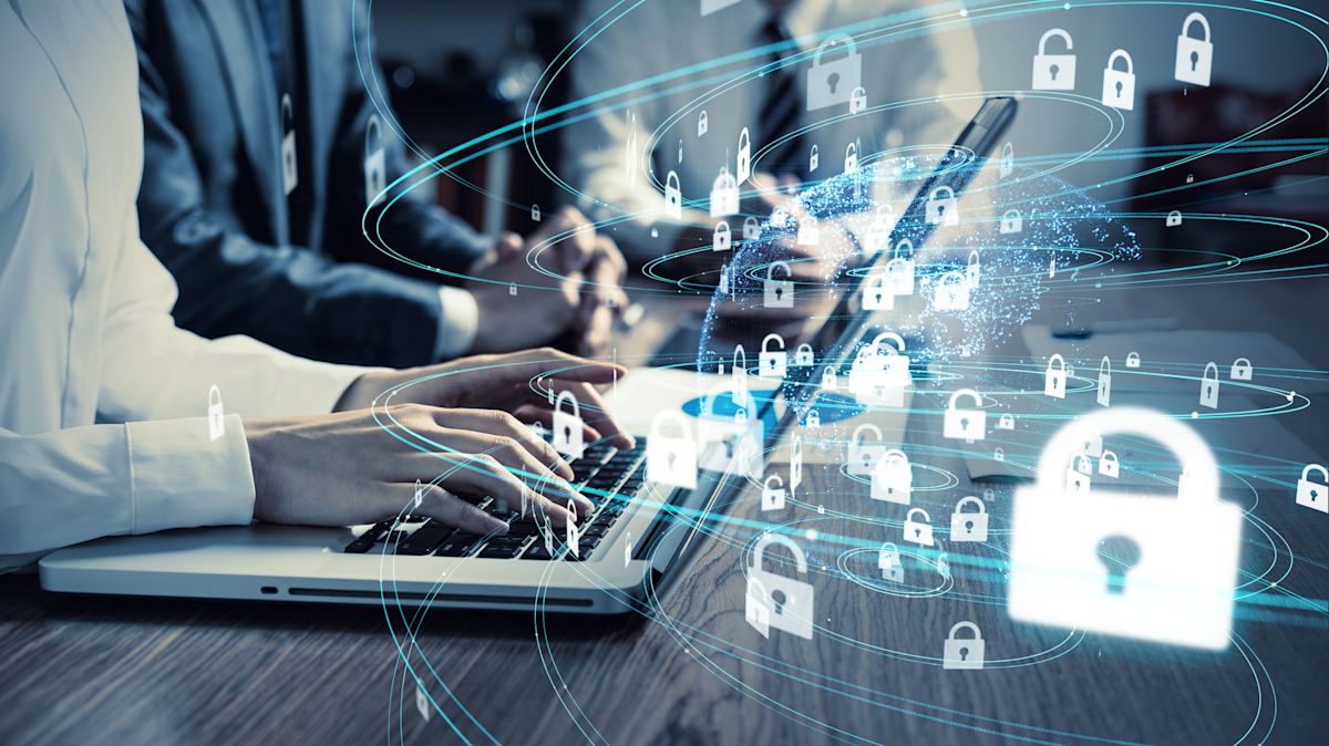 Stock image - laptops locks business security